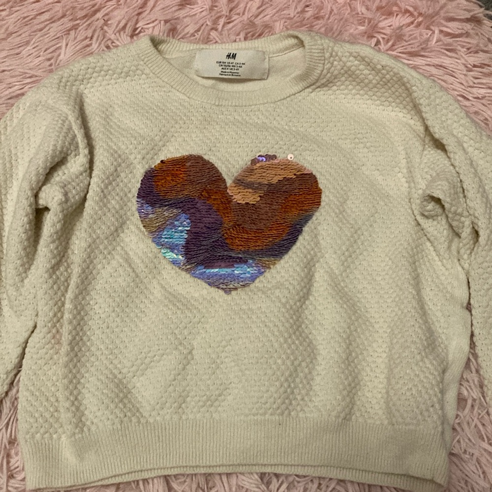 Pair of girls sweaters